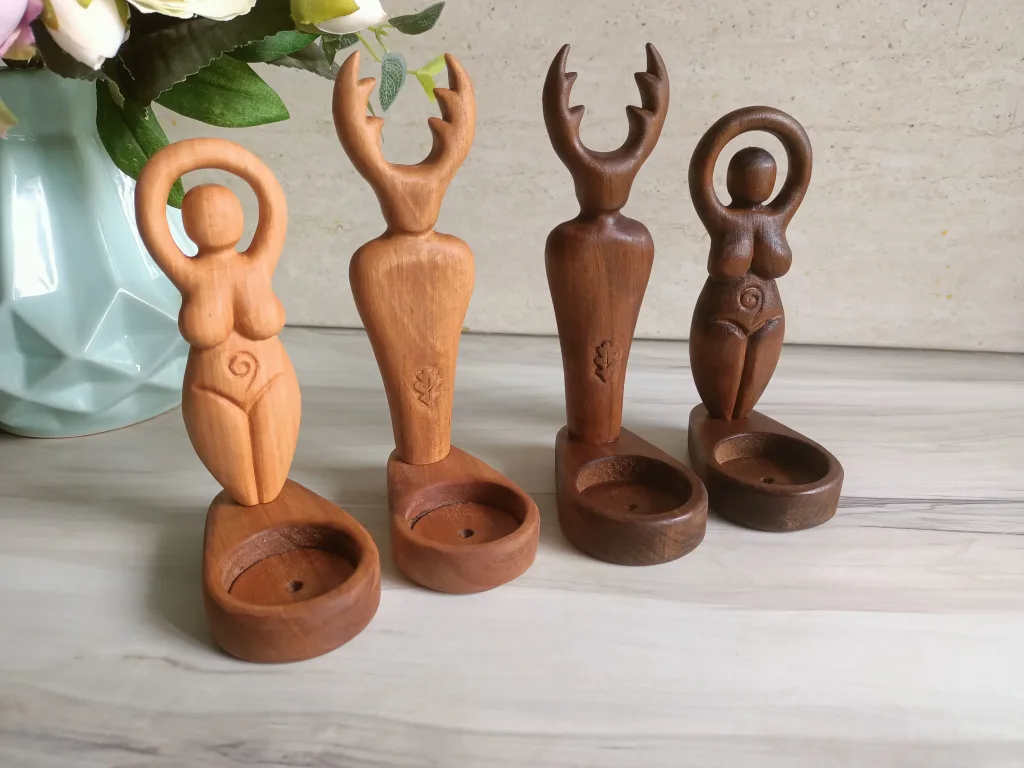 Four pagan deity candle holders without candles