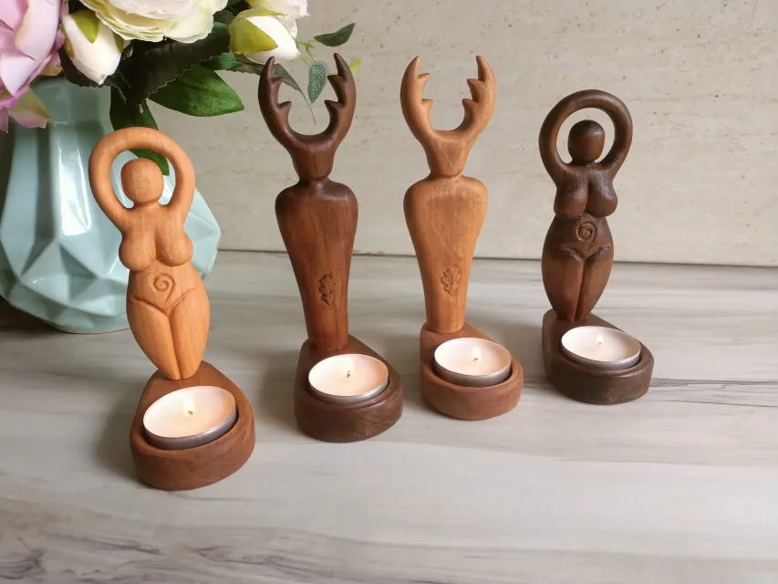 Wiccan god and goddess statues with candle holders