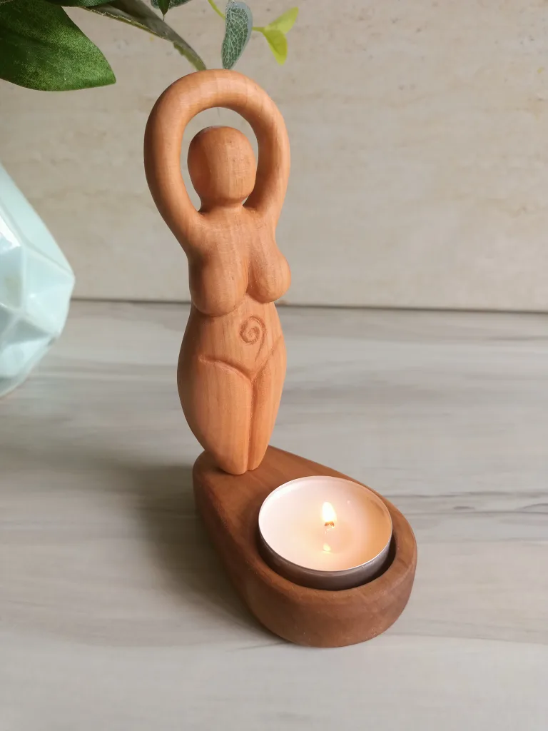 Beige Mother goddess with candle holder