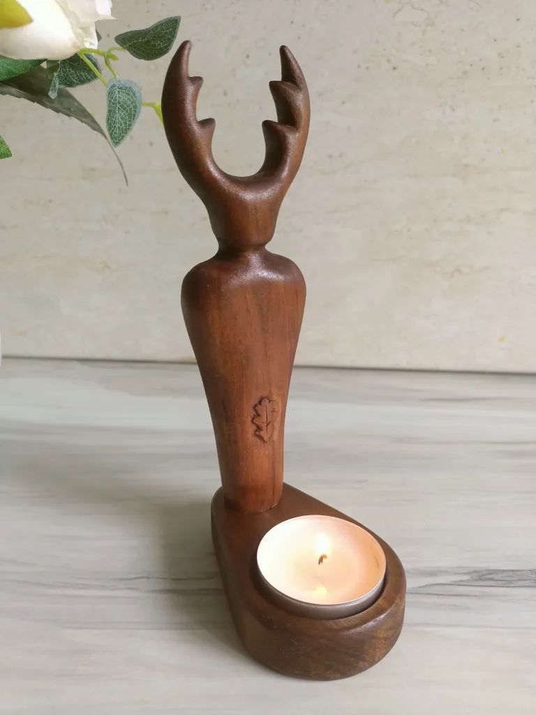 Brown horned god candle holder