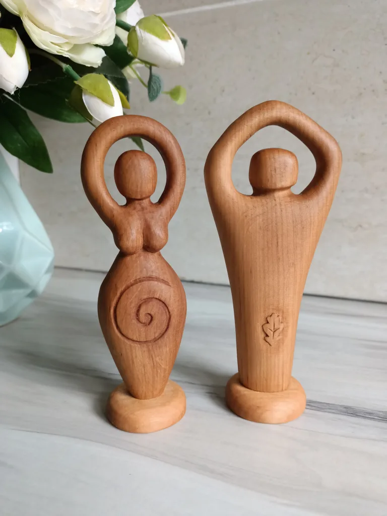 Couple of light fertility figurines