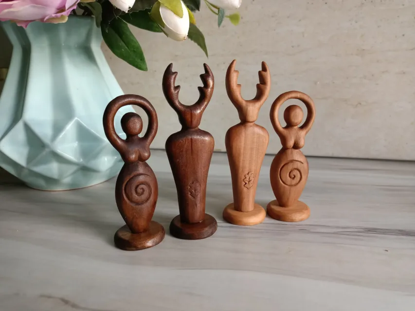 Horned god and goddess statues​ from wood for Wicca altar