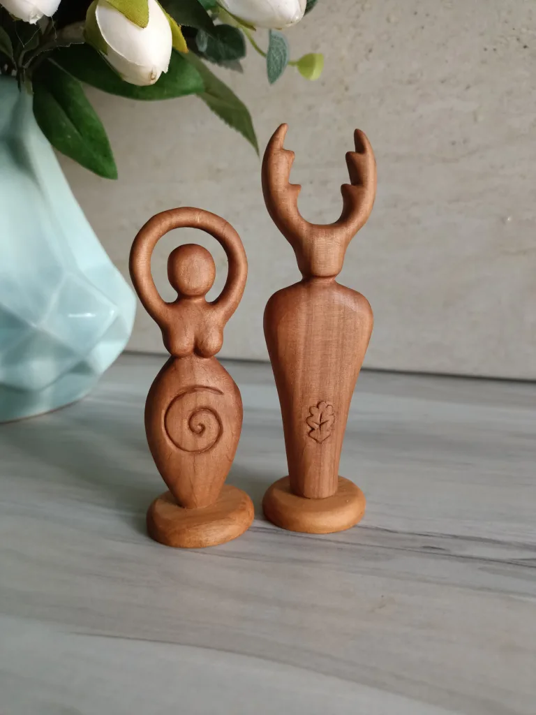 Light Horned god and goddess statues